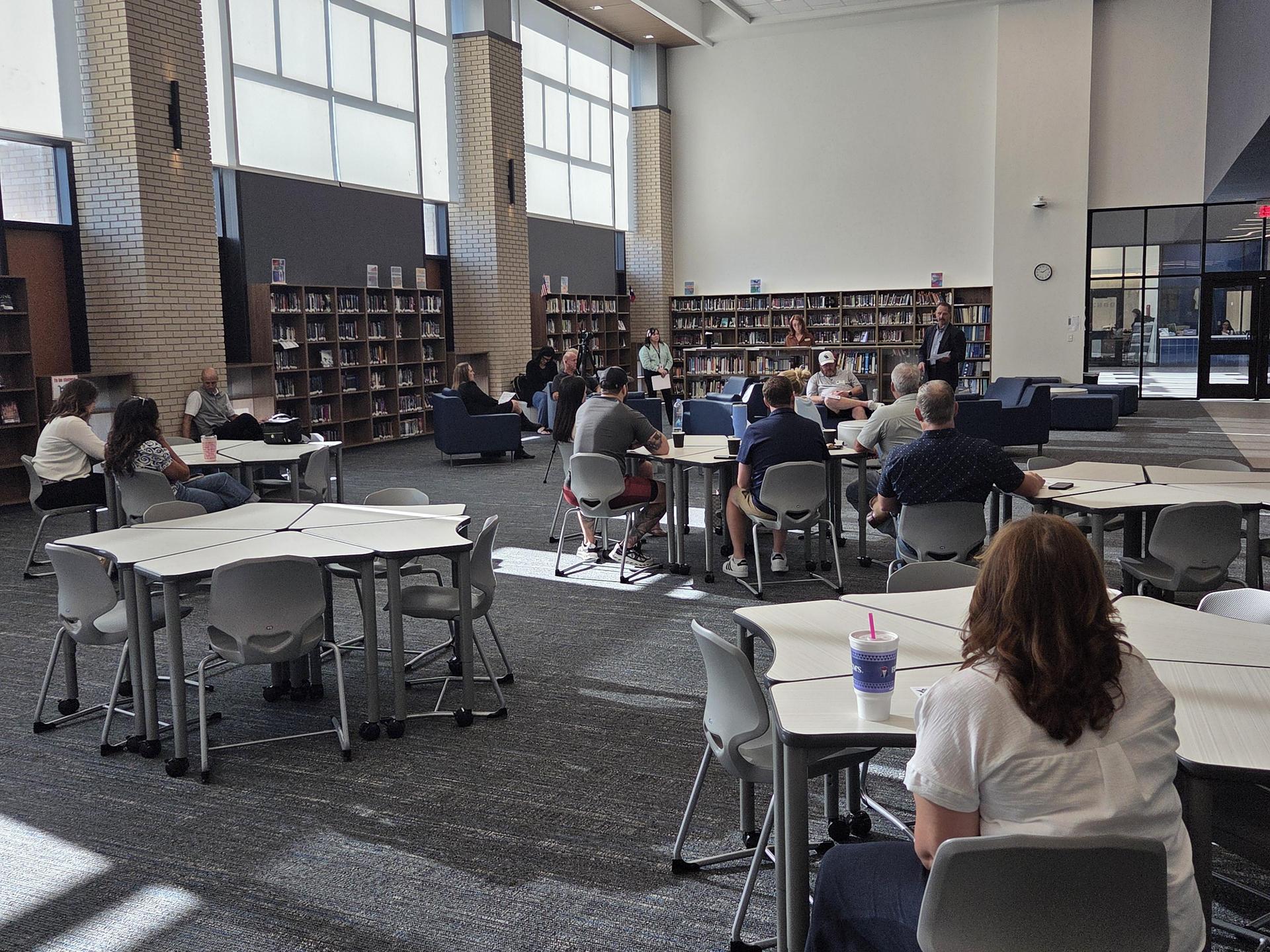 Community members listen as Dr. Brown discusses the current state of VAISD