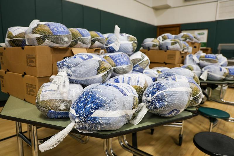 Turkeys in a pile on a table
