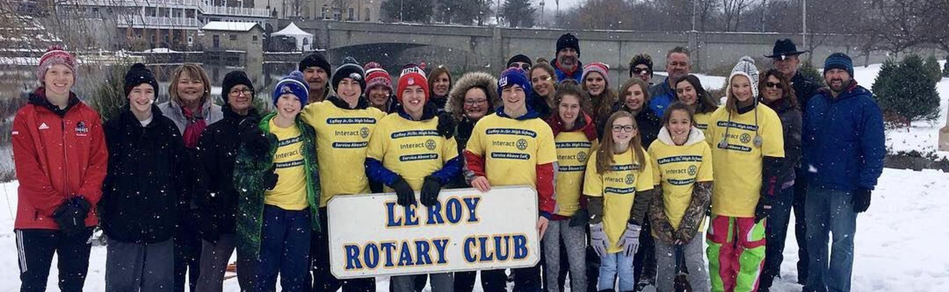 Rotary Interact Club putting up Christmas trees on the creek bank