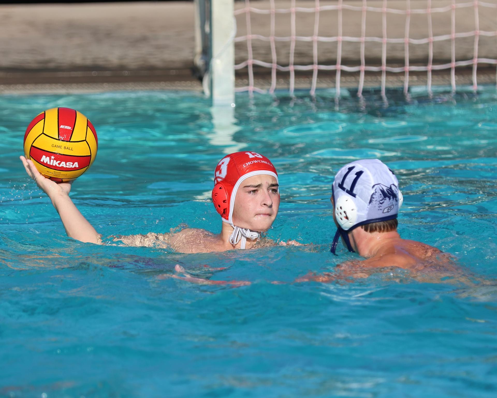 Boys playing water polo against Yosemite