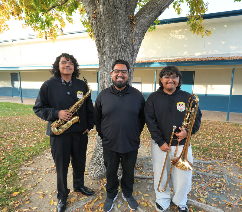 Group photo of Ulises Vargas (left) , Baldwin Park High School Band Director Juan Jasso (center), and Leo Espinoza (right).