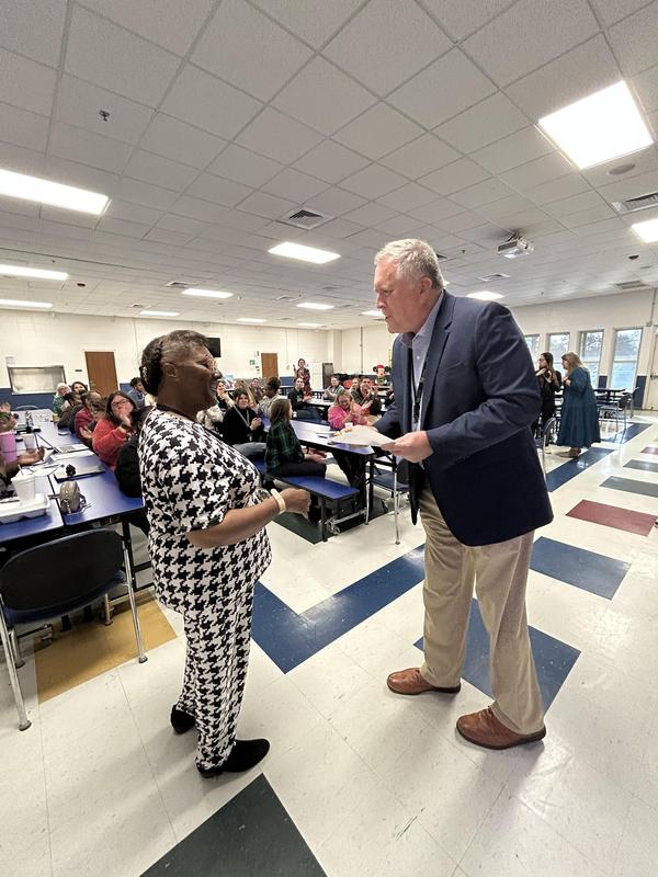 Rice Teachers Receive Checks from State Department