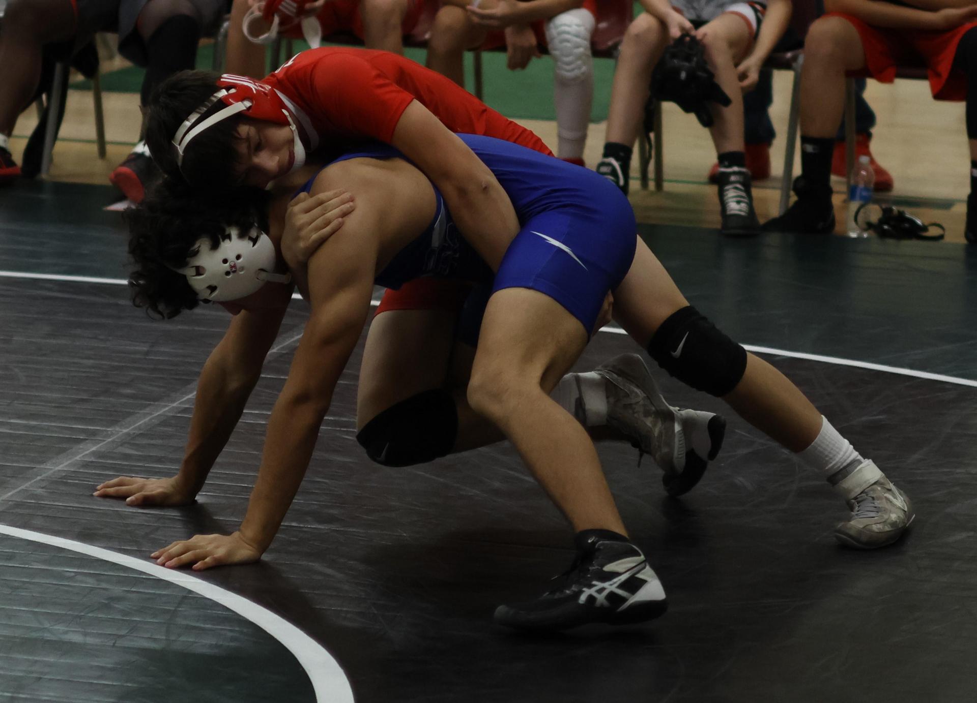 Boys wrestling in the Liberty Duals event 104