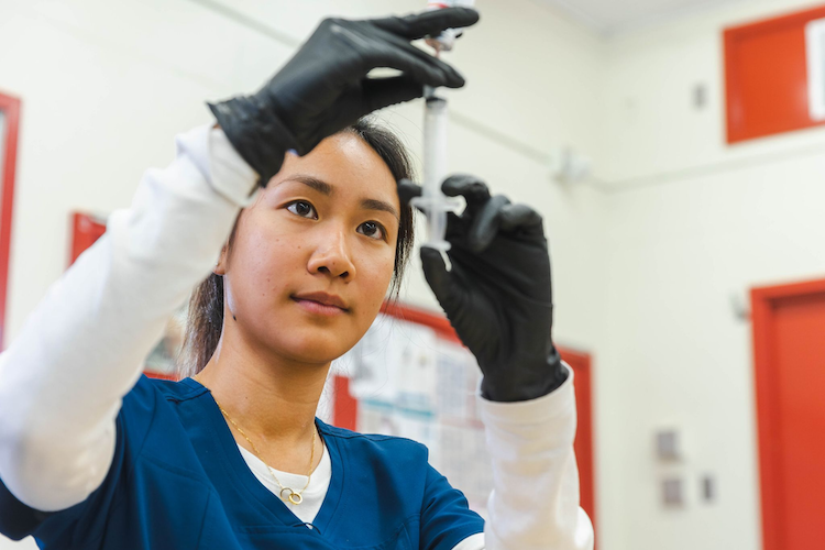 Student with test tube
