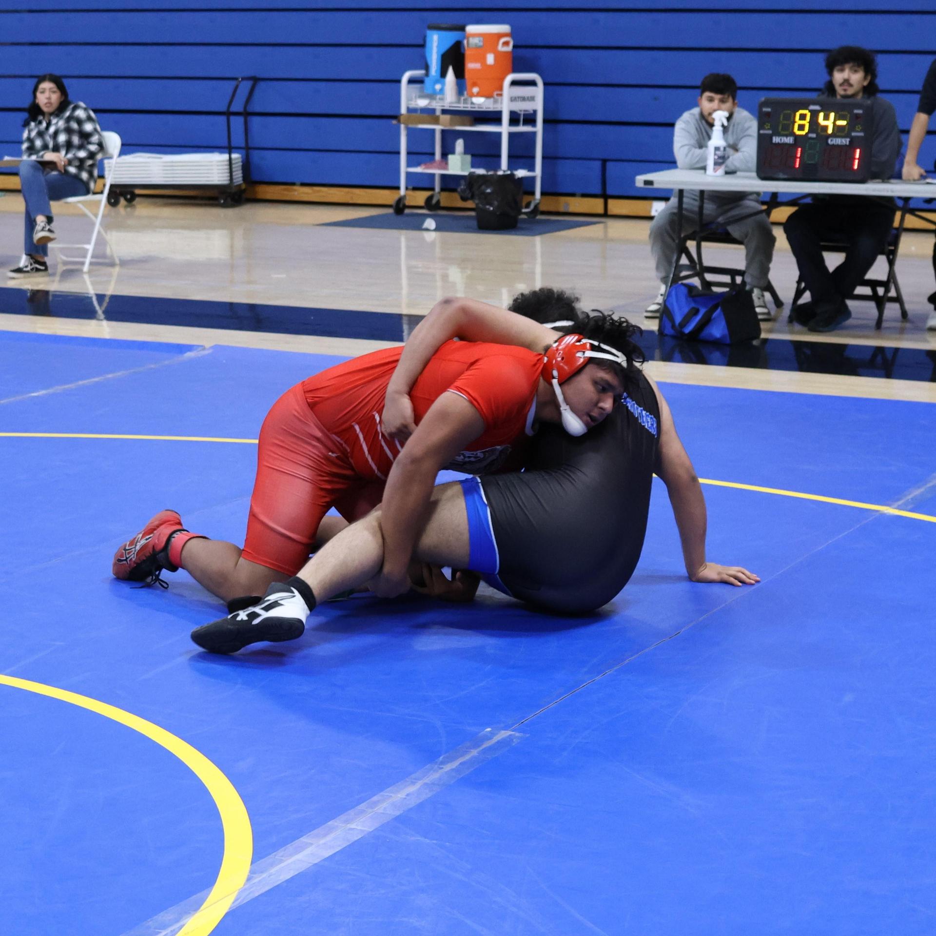 wrestlers in action at parlier