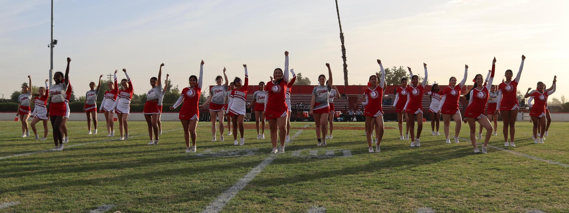 Cheerleaders performing at the football game
