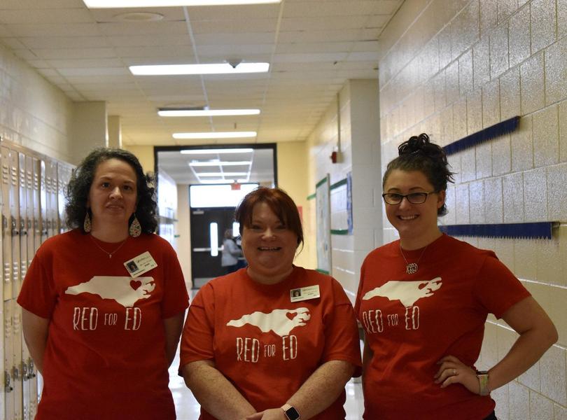 7th grade teachers posing in the hallway