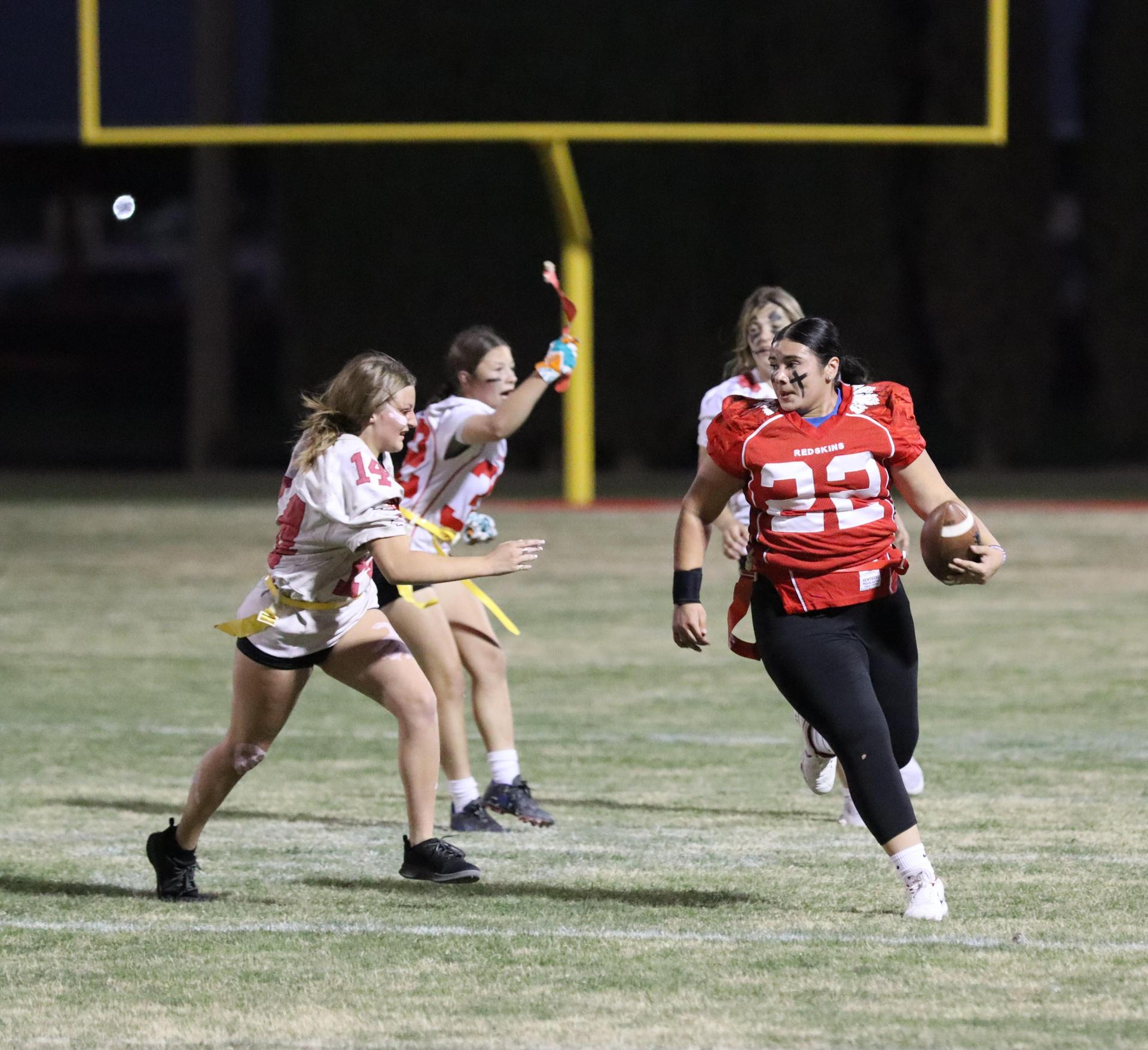 girls playing flag football