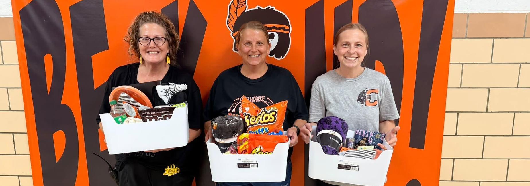 CES Custodians with an appreciation basket on National Custodians Day