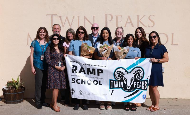 Twin Peaks Middle School counselors presented with RAMP banner