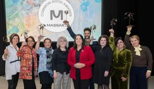Sarah Richards to the right of Lt. Gov. Kimberly Driscoll, along with other honorees