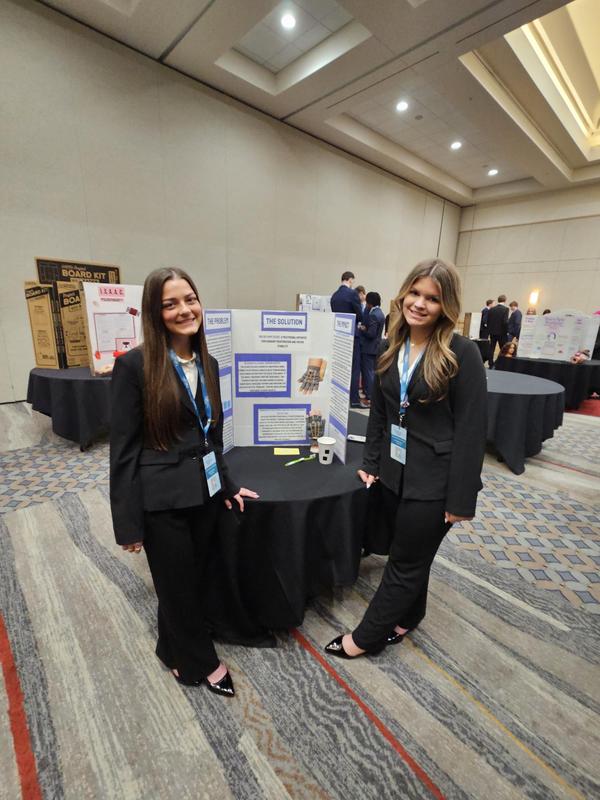 Smiling teens dressed in professional attire