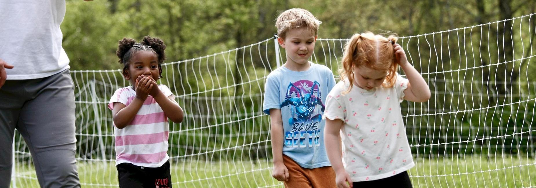 Children playing on a farm