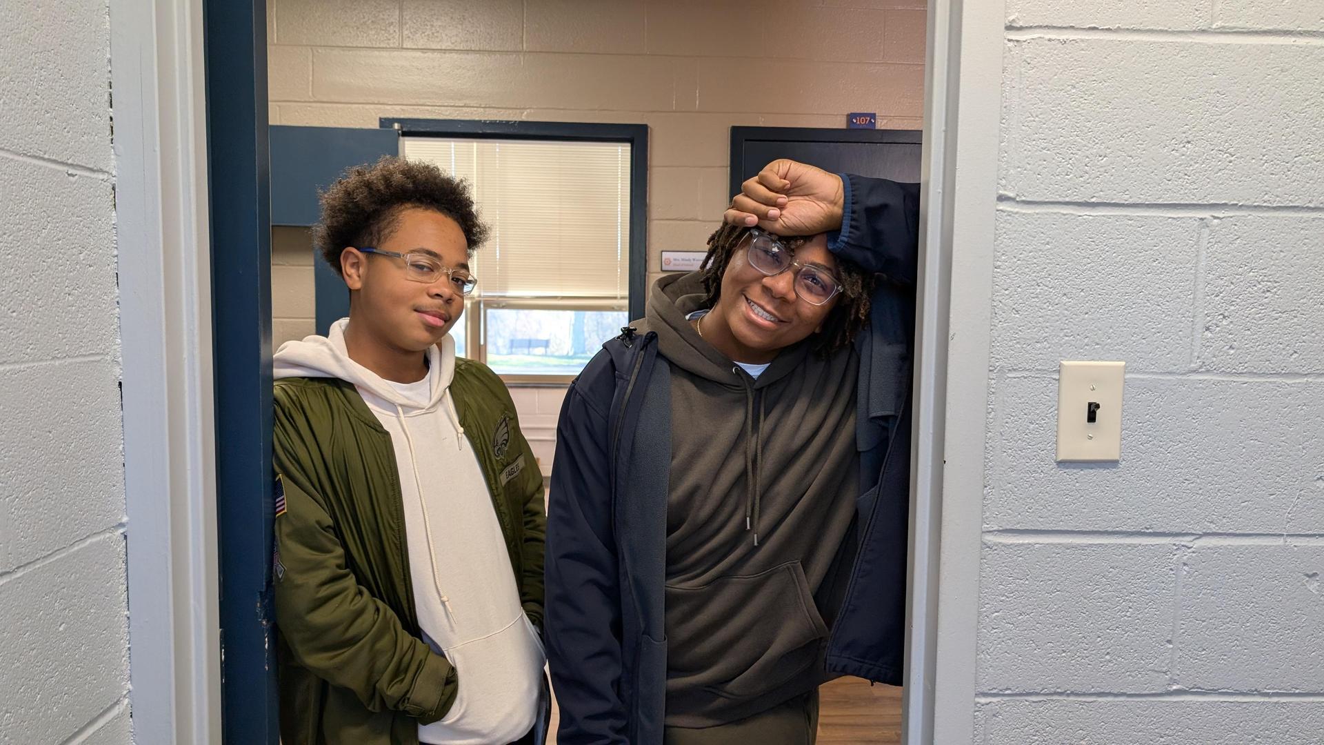 two middle school boys, just hanging out in the admin offices. 
