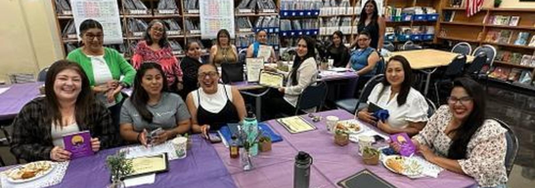 Volunteers seated for volunteer appreciation