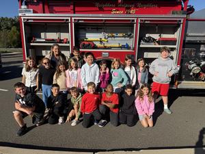 Students and fire truck for fire prevention week