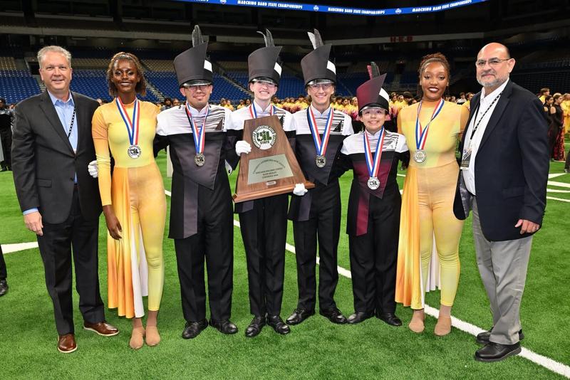DHS Wolf Band receiving silver medal