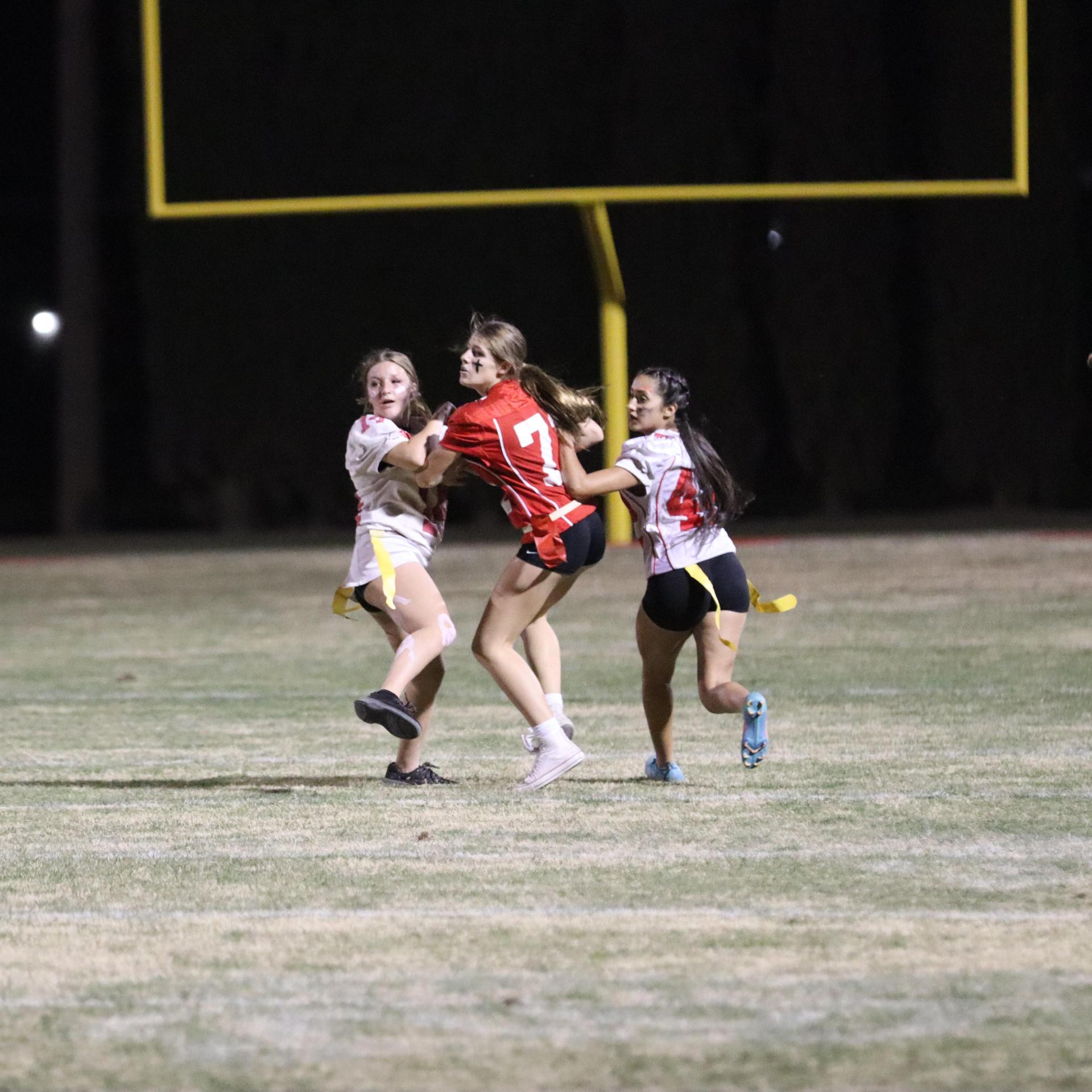 girls playing flag football