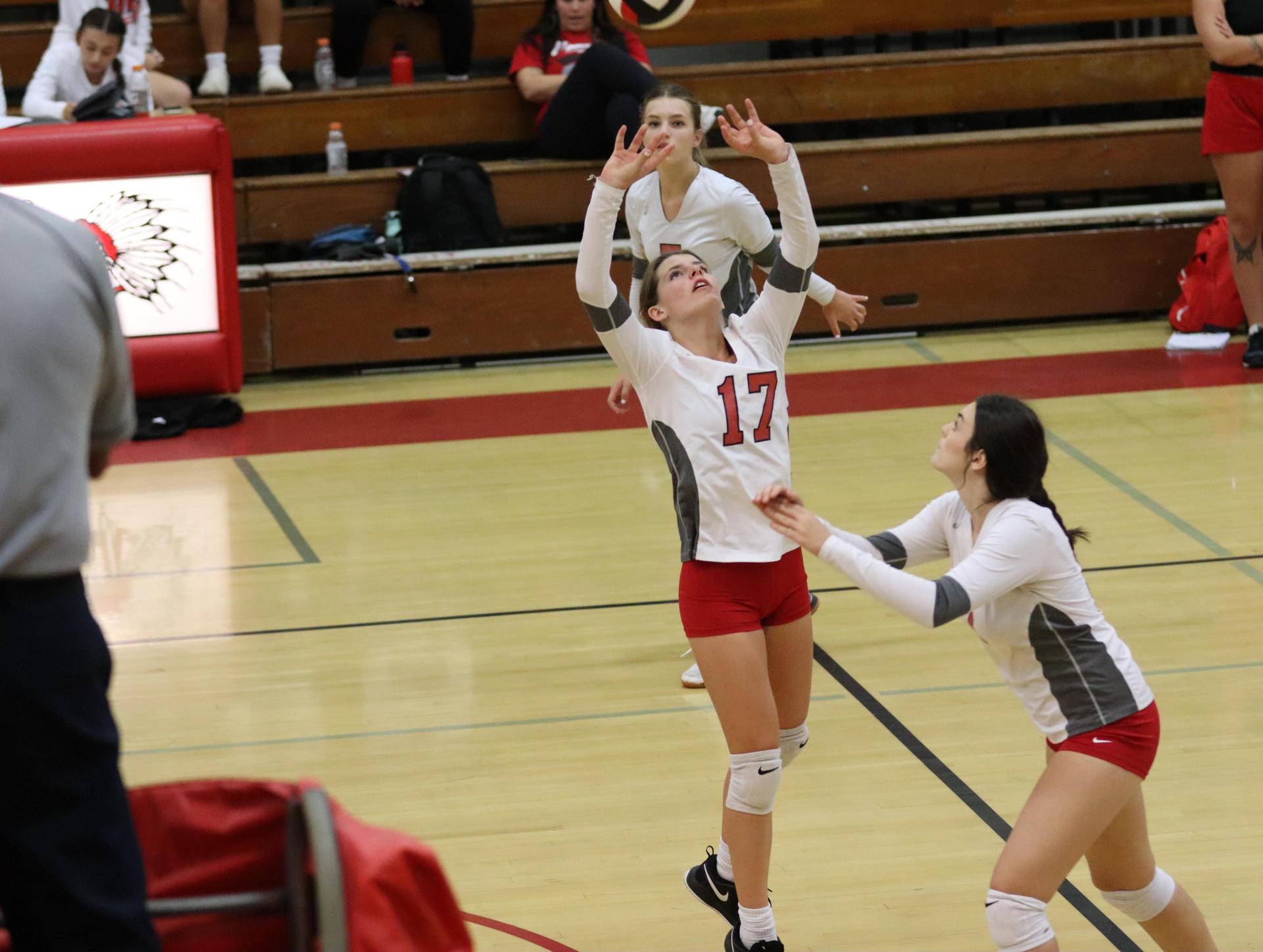 junior varsity girls playing volleyball against Liberty