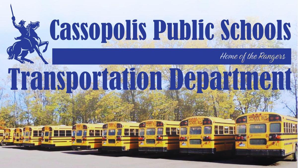 Transportation Department banner with row of yellow school buses.