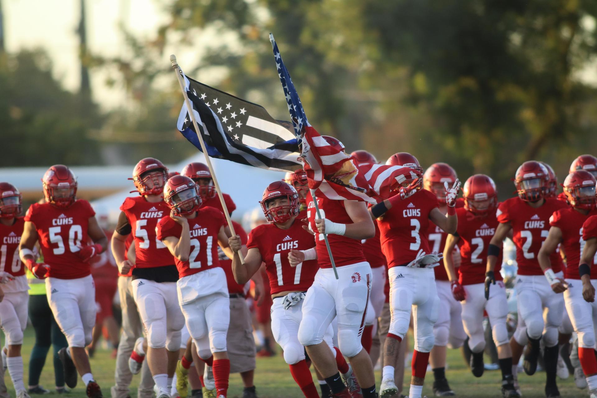 Students enjoying the football game against hoover
