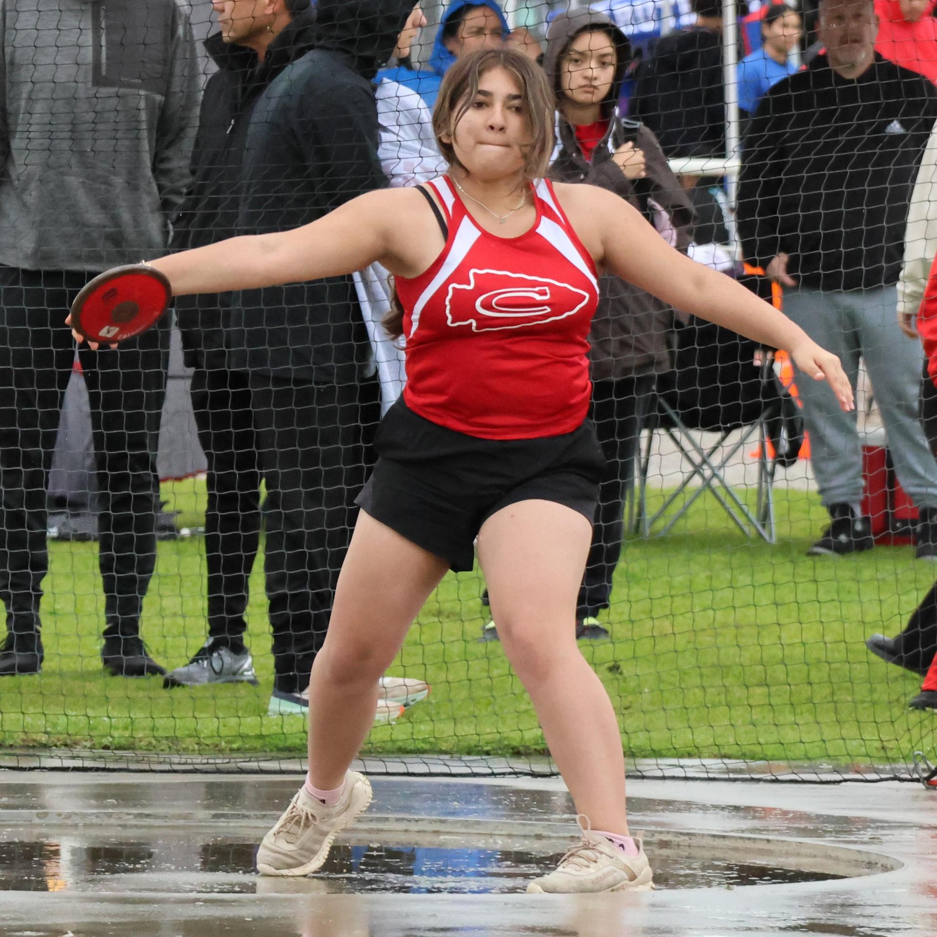 girls throwing the discus