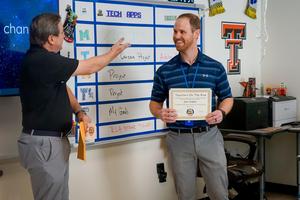 jon sides being told he is the teacher on the rise winner