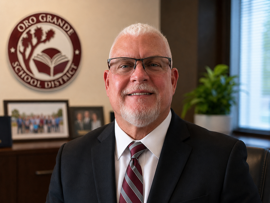 Superintendent Shawn Bell smiling at the camera
