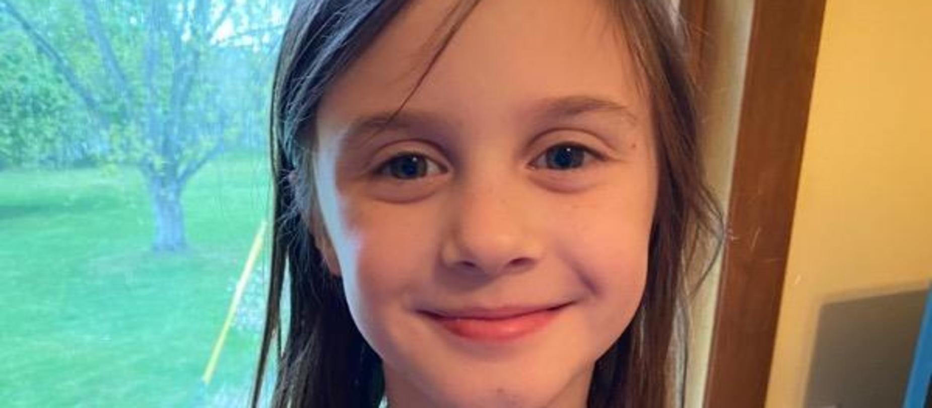 girl smiling for the camera