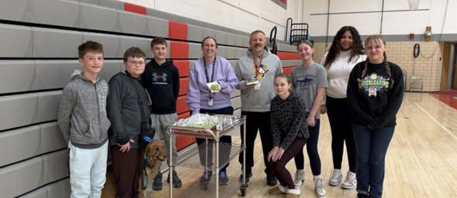 Students providing treats to teachers.