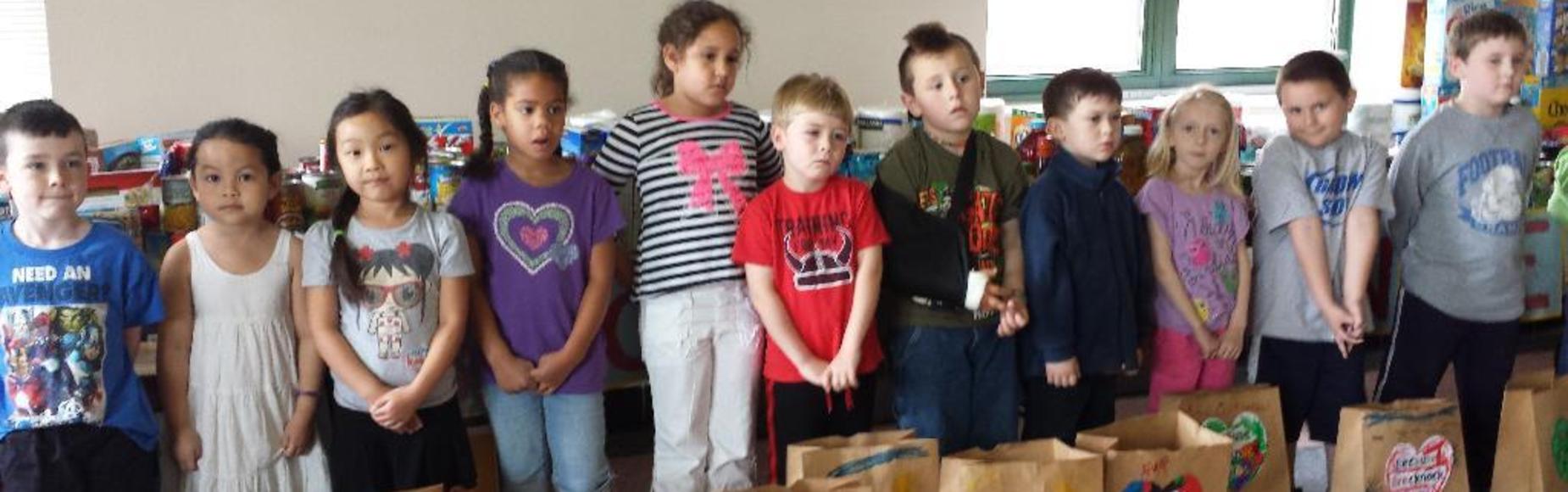 Students with Paper Bags Picture