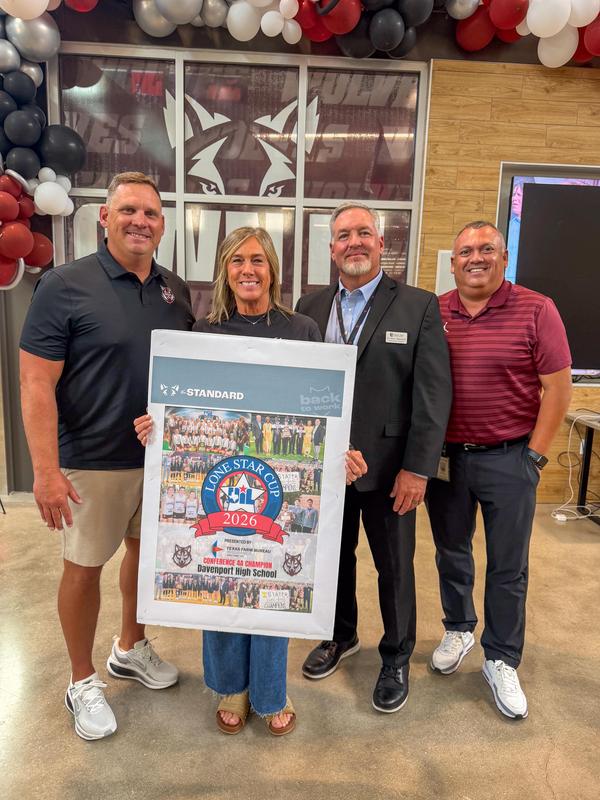 Group photo of DHS Athletic Coordinator James Zimmerhanzel, Principal Angela Looney, Superintendent Dr. John Chapman, and Athletic Director Brian Martinez.