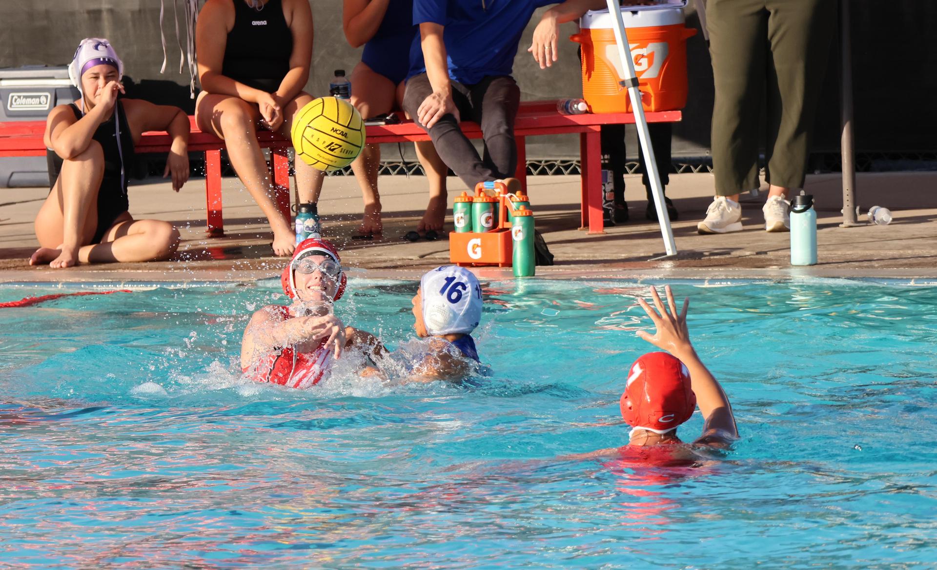 girls playing water polo against Sanger West