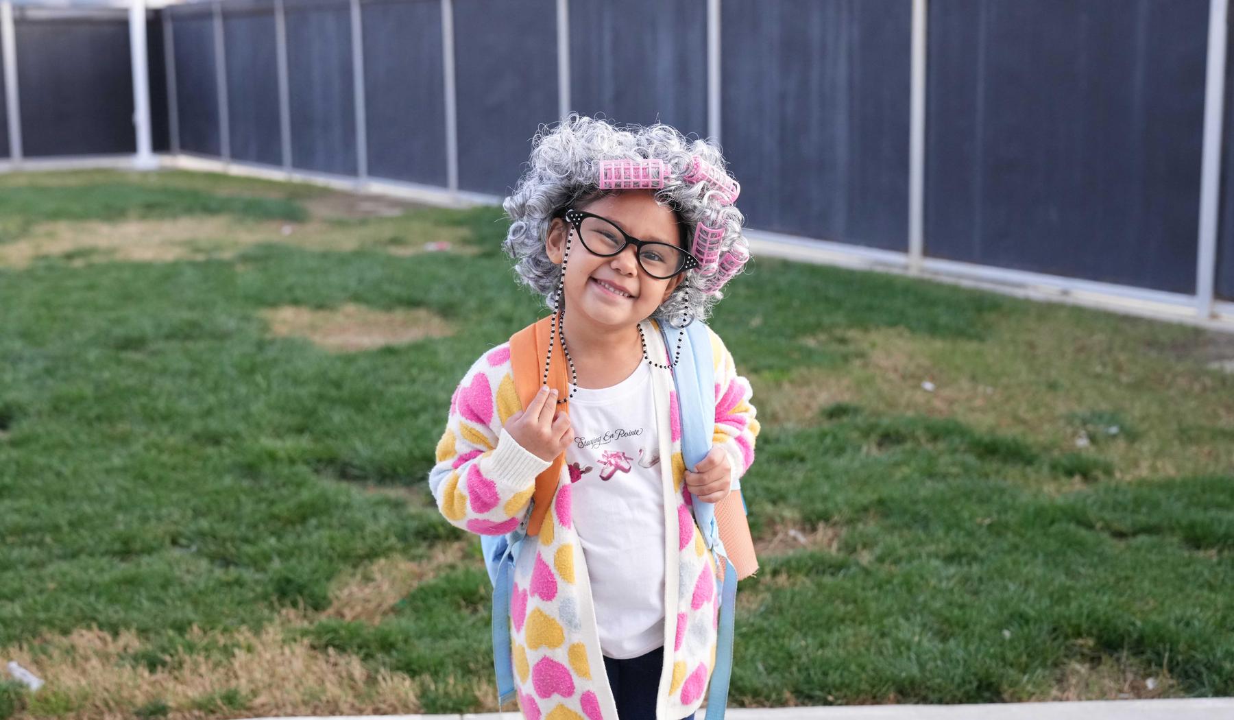 Girl dressed up as a 100 year old