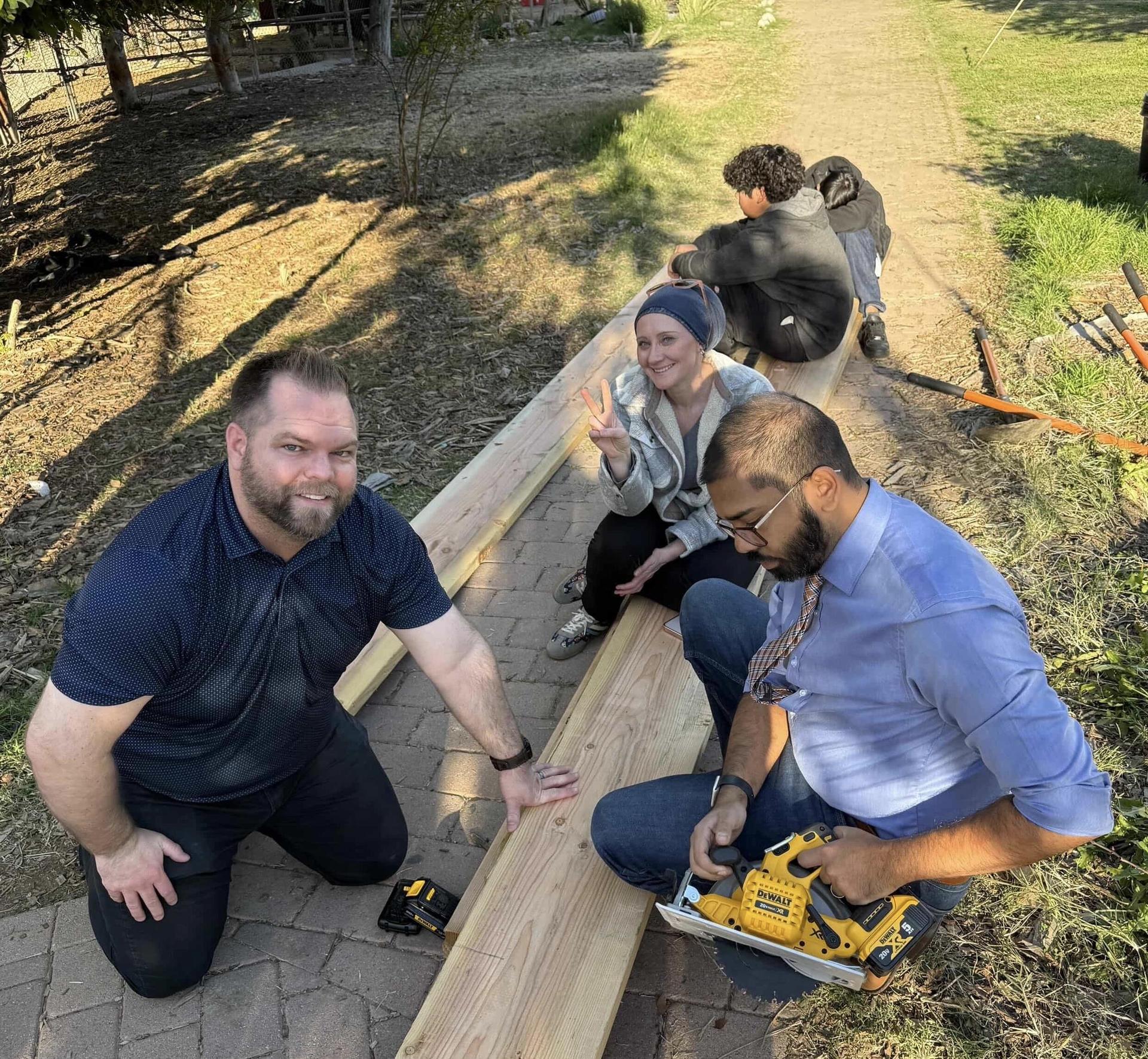 Science dept coming together to build raised beds for the students. :)