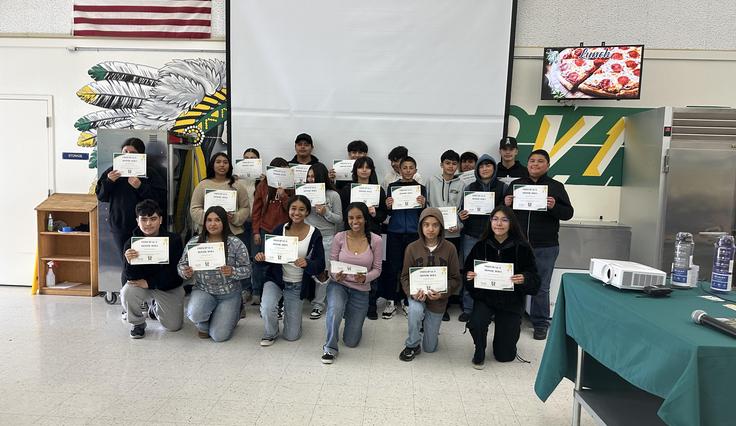 Awards night. Students displaying their awards