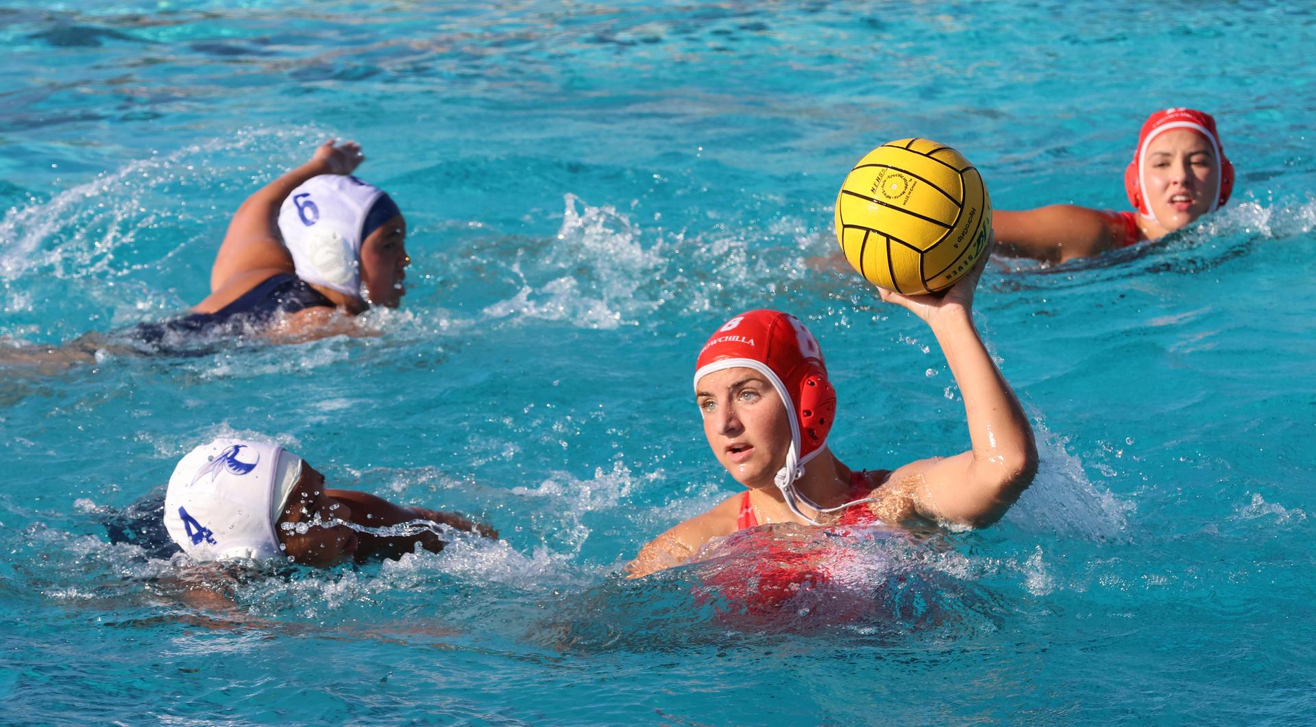 girls playing water polo against Sanger West