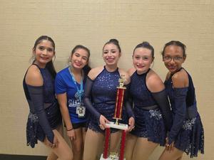 MHS twirlers with competition trophy
