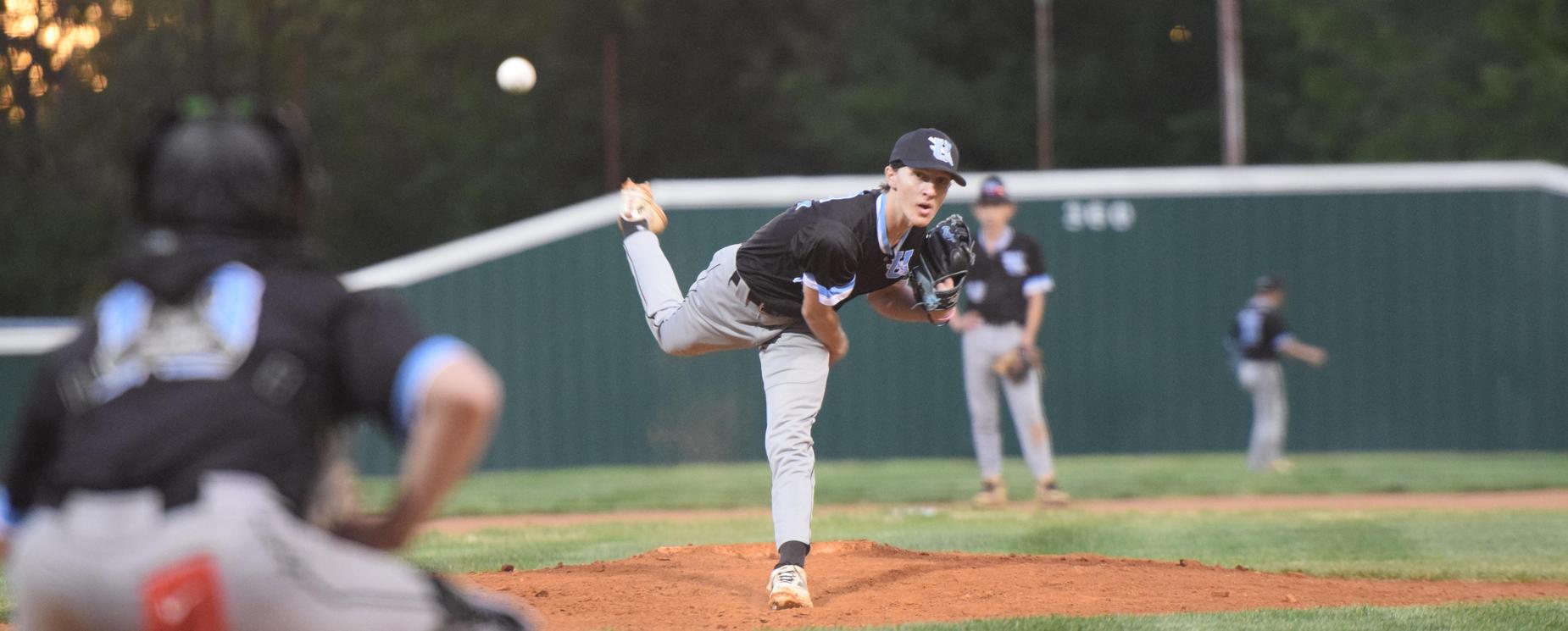 Baseball player pitching