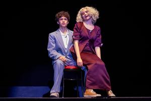 Two performers during a song