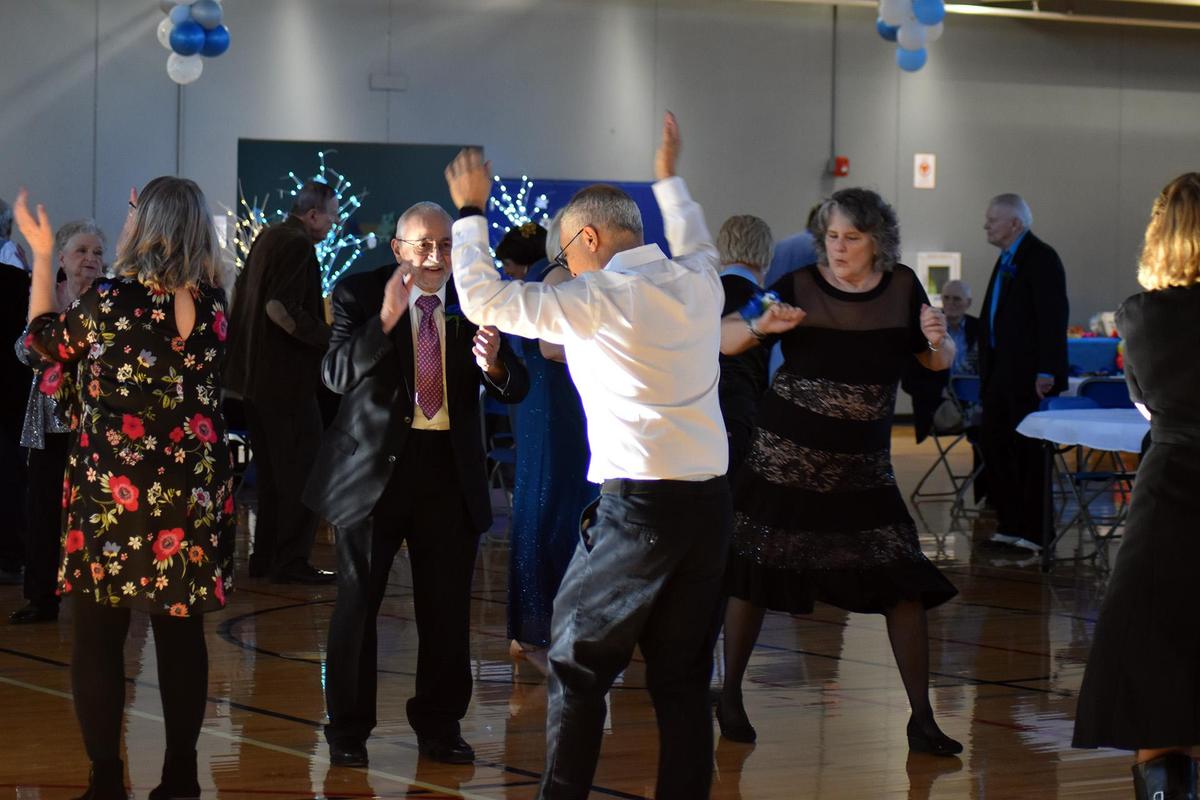 Puzzle Palooza participants putting together puzzle