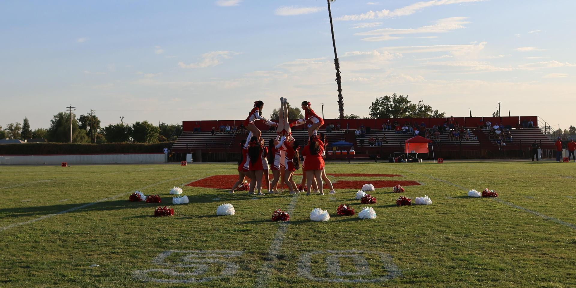Junior Varsity Cheerleaders in action at halftime 8