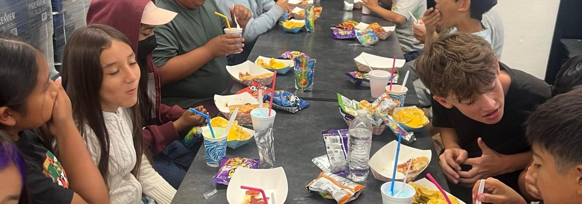 5th Grade students eating snacks at the 5th Grade Luncheon