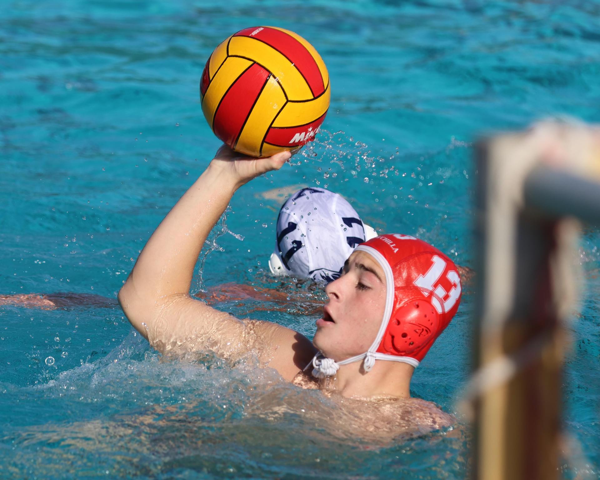 Boys playing water polo against Yosemite