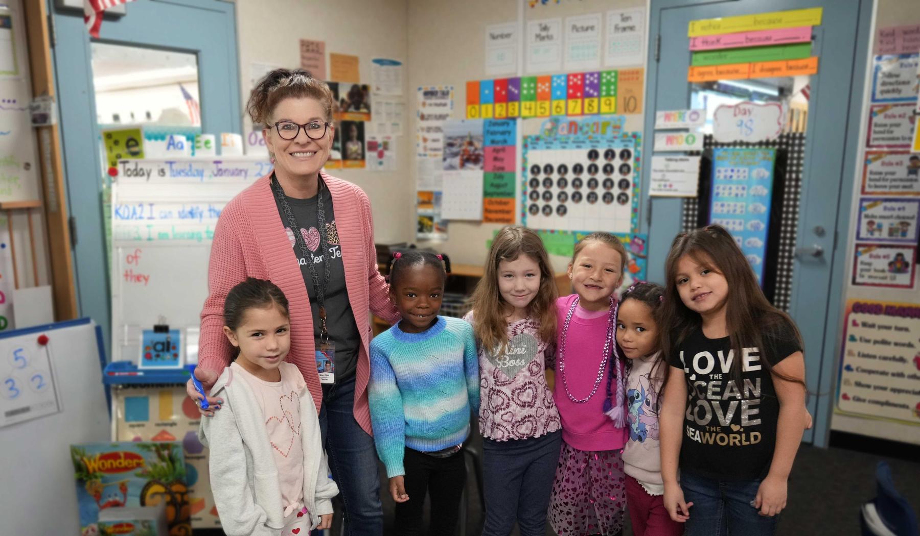 classroom students and teacher on heart dress up day