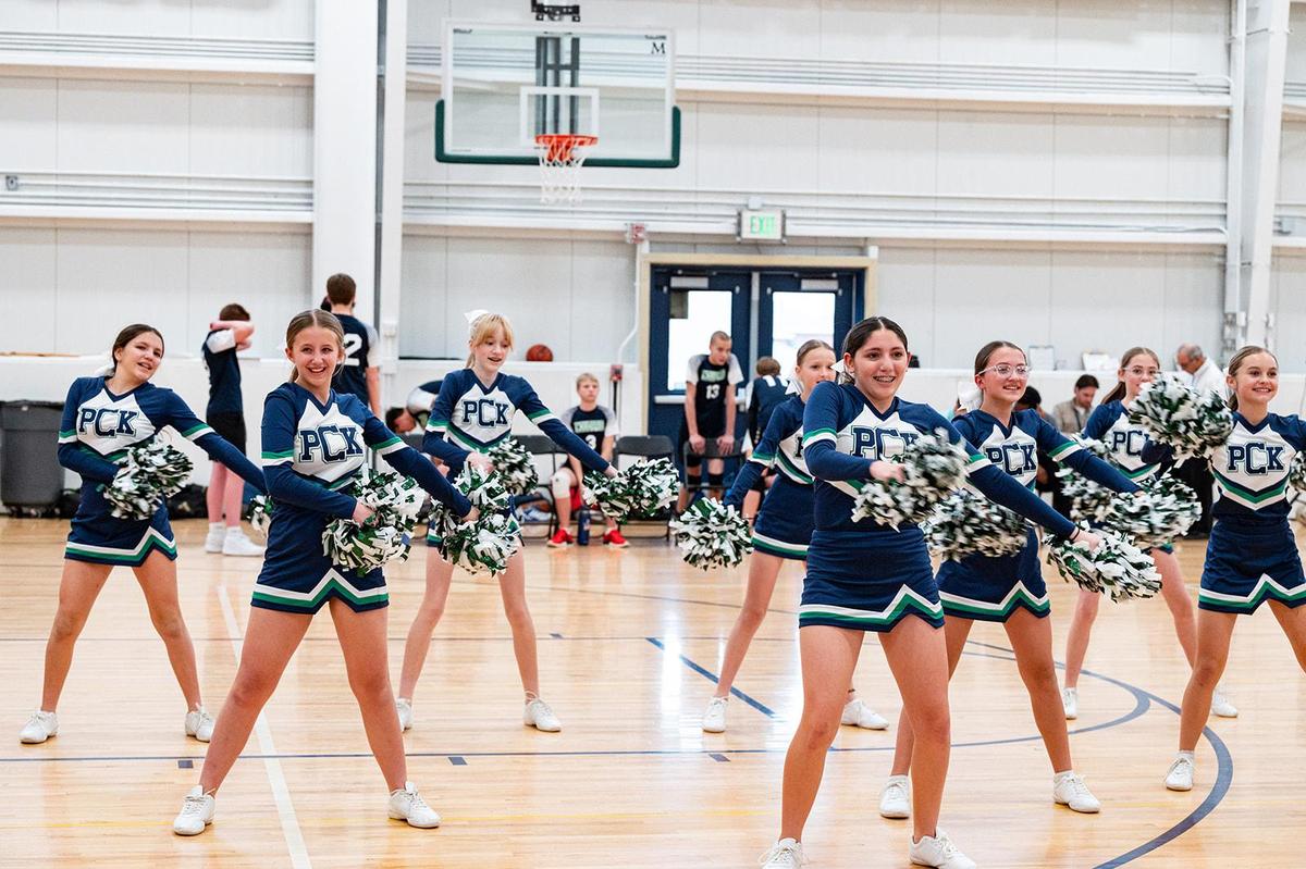 Spirit Team Performs at Boys Volleyball Game