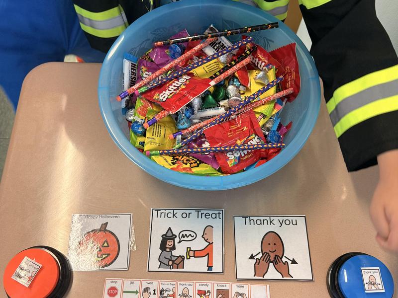 Trick or treat visuals and candy with assistive technology