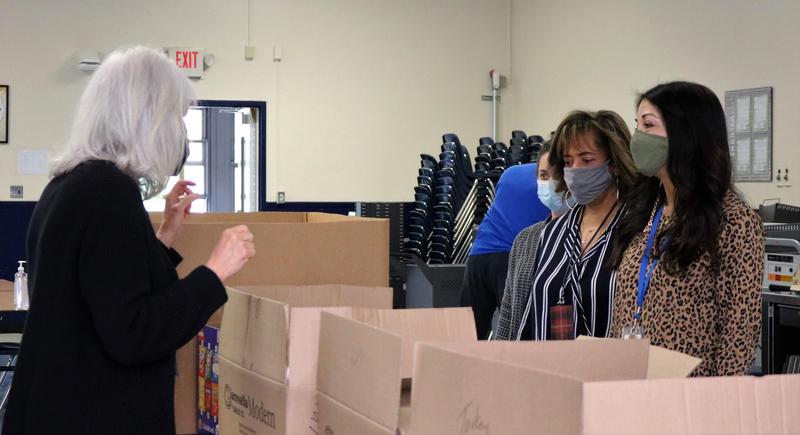 Westfield High School counselor Jan Fine serves lunch to WHS teachers and staff as part of a WEA initiative to thank them for their hard work over the past year.