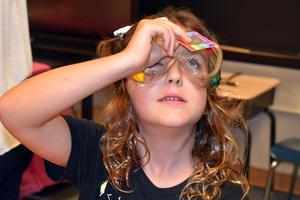 young students conducting science experiments
