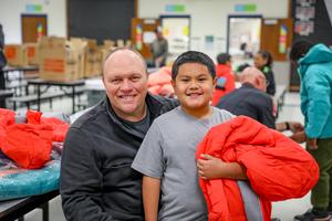 westwind student smiling with lubbock firefighter